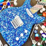 Construindo uma guitarra com lixo por Burls Art